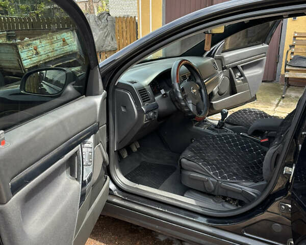 Черный Опель Вектра, объемом двигателя 2.2 л и пробегом 262 тыс. км за 3800 $, фото 11 на Automoto.ua