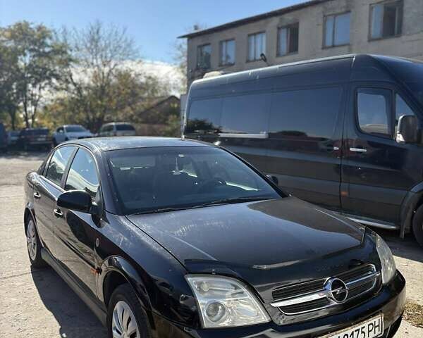 Черный Опель Вектра, объемом двигателя 2 л и пробегом 350 тыс. км за 3200 $, фото 1 на Automoto.ua