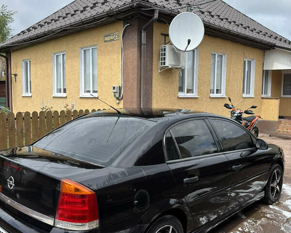 Черный Опель Вектра, объемом двигателя 2.2 л и пробегом 262 тыс. км за 3800 $, фото 5 на Automoto.ua