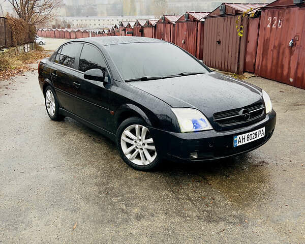 Черный Опель Вектра, объемом двигателя 2.2 л и пробегом 240 тыс. км за 3600 $, фото 1 на Automoto.ua