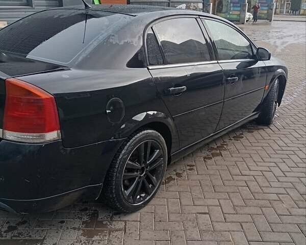 Черный Опель Вектра, объемом двигателя 2.2 л и пробегом 300 тыс. км за 3000 $, фото 2 на Automoto.ua