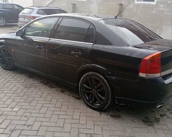 Черный Опель Вектра, объемом двигателя 2.2 л и пробегом 300 тыс. км за 3000 $, фото 3 на Automoto.ua