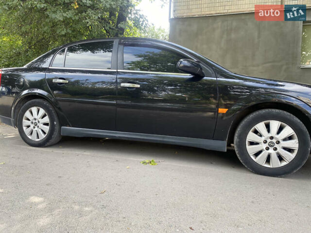 Чорний Опель Вектра, об'ємом двигуна 2.2 л та пробігом 350 тис. км за 4400 $, фото 1 на Automoto.ua