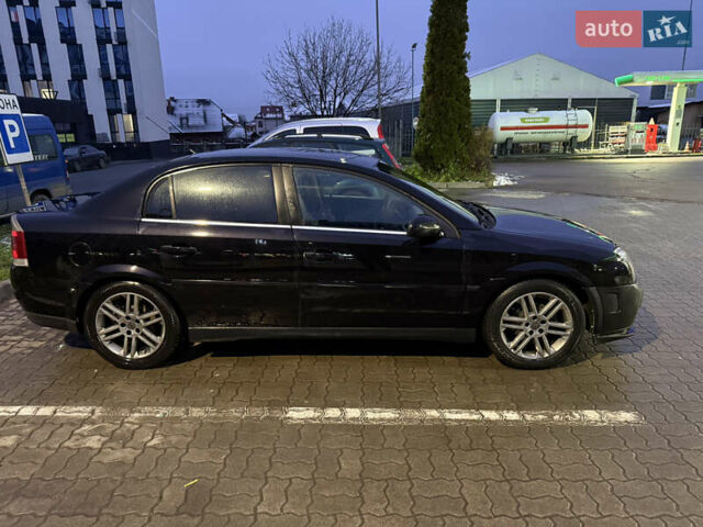 Черный Опель Вектра, объемом двигателя 2.2 л и пробегом 240 тыс. км за 5500 $, фото 11 на Automoto.ua