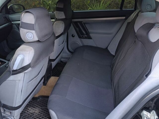 Черный Опель Вектра, объемом двигателя 2 л и пробегом 430 тыс. км за 3100 $, фото 6 на Automoto.ua