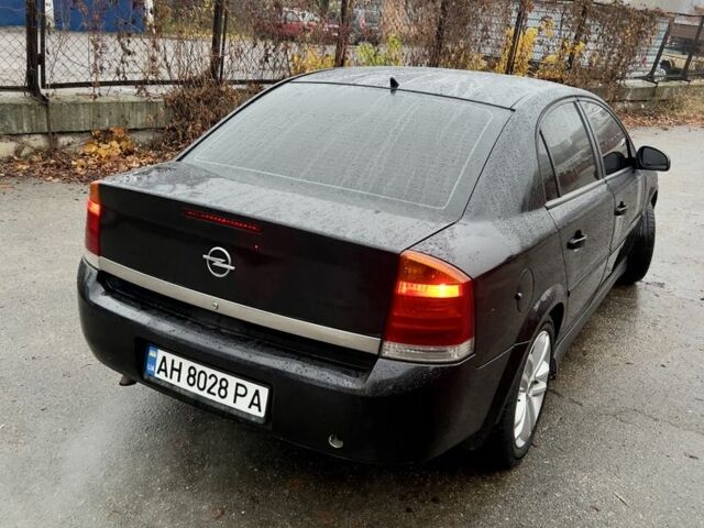 Черный Опель Вектра, объемом двигателя 2.2 л и пробегом 230 тыс. км за 3600 $, фото 4 на Automoto.ua