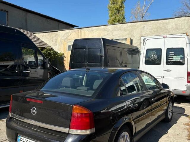 Черный Опель Вектра, объемом двигателя 2 л и пробегом 320 тыс. км за 3200 $, фото 2 на Automoto.ua