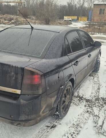 Чорний Опель Вектра, об'ємом двигуна 2 л та пробігом 369 тис. км за 1999 $, фото 4 на Automoto.ua