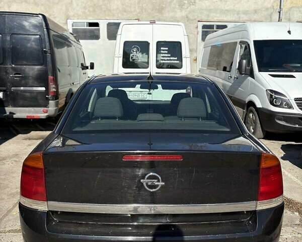 Черный Опель Вектра, объемом двигателя 2 л и пробегом 350 тыс. км за 3200 $, фото 4 на Automoto.ua