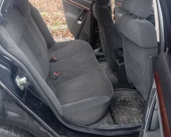 Черный Опель Вектра, объемом двигателя 2.2 л и пробегом 300 тыс. км за 3000 $, фото 10 на Automoto.ua