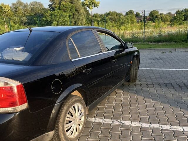 Черный Опель Вектра, объемом двигателя 2.2 л и пробегом 238 тыс. км за 4150 $, фото 2 на Automoto.ua
