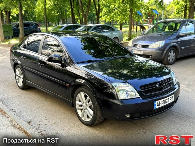 Черный Опель Вектра, объемом двигателя 2.2 л и пробегом 258 тыс. км за 3500 $, фото 2 на Automoto.ua