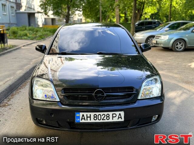 Черный Опель Вектра, объемом двигателя 2.2 л и пробегом 258 тыс. км за 3500 $, фото 1 на Automoto.ua