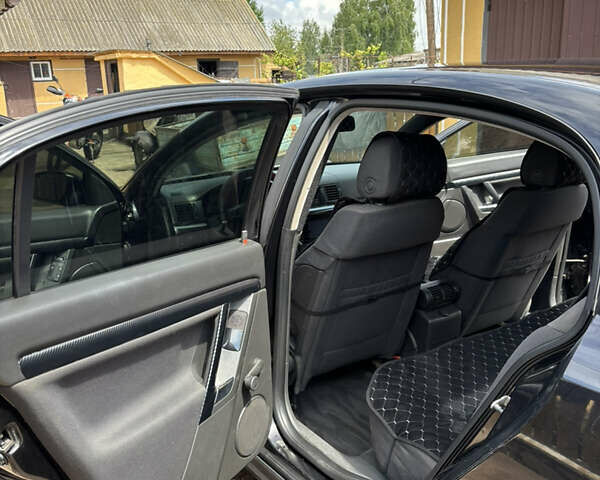 Черный Опель Вектра, объемом двигателя 2.2 л и пробегом 262 тыс. км за 3800 $, фото 12 на Automoto.ua