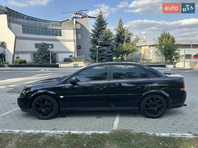 Черный Опель Вектра, объемом двигателя 2.2 л и пробегом 268 тыс. км за 4900 $, фото 2 на Automoto.ua