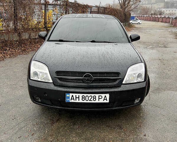 Черный Опель Вектра, объемом двигателя 2.2 л и пробегом 240 тыс. км за 3600 $, фото 2 на Automoto.ua