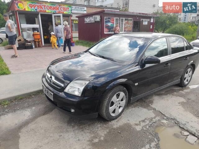 Черный Опель Вектра, объемом двигателя 2.2 л и пробегом 260 тыс. км за 4000 $, фото 4 на Automoto.ua