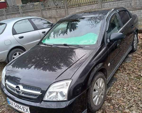 Черный Опель Вектра, объемом двигателя 2.2 л и пробегом 330 тыс. км за 4000 $, фото 1 на Automoto.ua