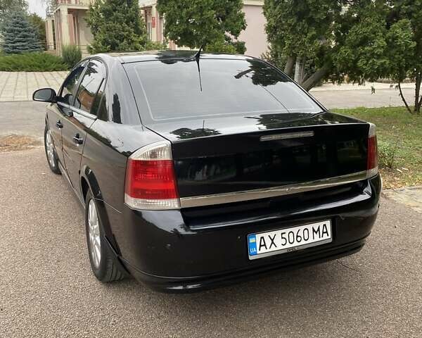 Черный Опель Вектра, объемом двигателя 2.2 л и пробегом 240 тыс. км за 6000 $, фото 1 на Automoto.ua