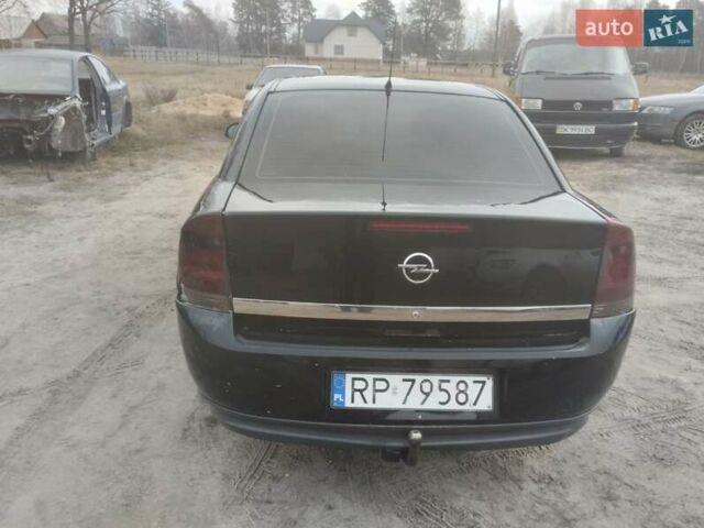 Черный Опель Вектра, объемом двигателя 2.2 л и пробегом 111 тыс. км за 1900 $, фото 3 на Automoto.ua