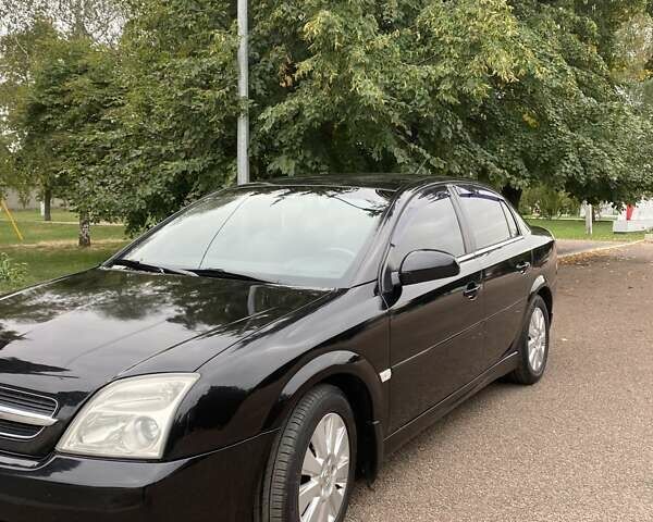 Черный Опель Вектра, объемом двигателя 2.2 л и пробегом 240 тыс. км за 6000 $, фото 5 на Automoto.ua