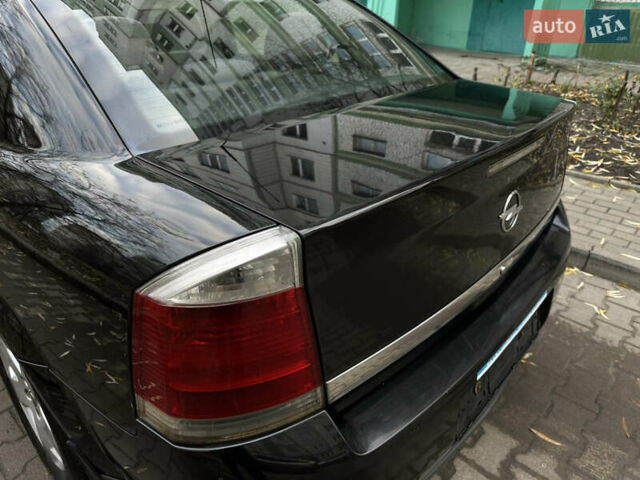 Черный Опель Вектра, объемом двигателя 2.2 л и пробегом 238 тыс. км за 3650 $, фото 13 на Automoto.ua