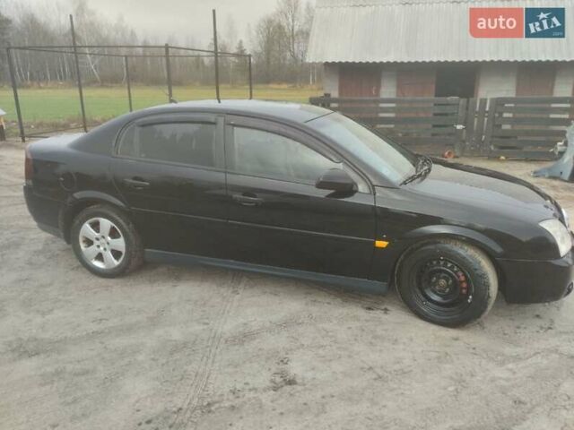 Черный Опель Вектра, объемом двигателя 2.2 л и пробегом 111 тыс. км за 1900 $, фото 2 на Automoto.ua