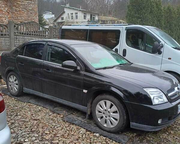 Черный Опель Вектра, объемом двигателя 2.2 л и пробегом 330 тыс. км за 4000 $, фото 3 на Automoto.ua