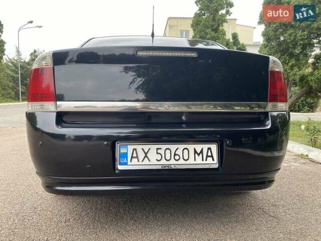Черный Опель Вектра, объемом двигателя 2.2 л и пробегом 240 тыс. км за 6000 $, фото 3 на Automoto.ua