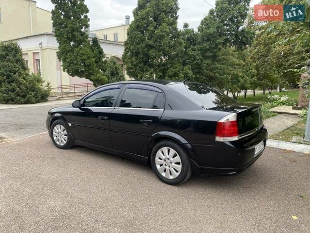 Черный Опель Вектра, объемом двигателя 2.2 л и пробегом 240 тыс. км за 6000 $, фото 2 на Automoto.ua