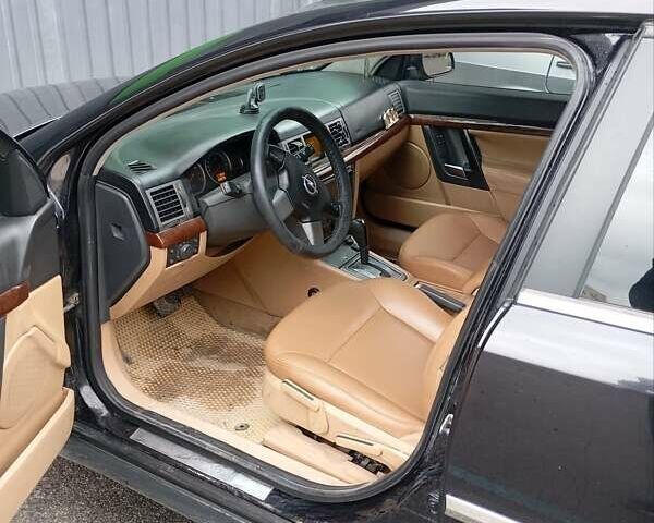 Опель Вектра 2004 в Каменце-Подольском на Automoto.ua Черный Опель Вектра, объемом двигателя 2.2 л и пробегом 340 тыс. км за 3600 $, фото 1 на Automoto.ua