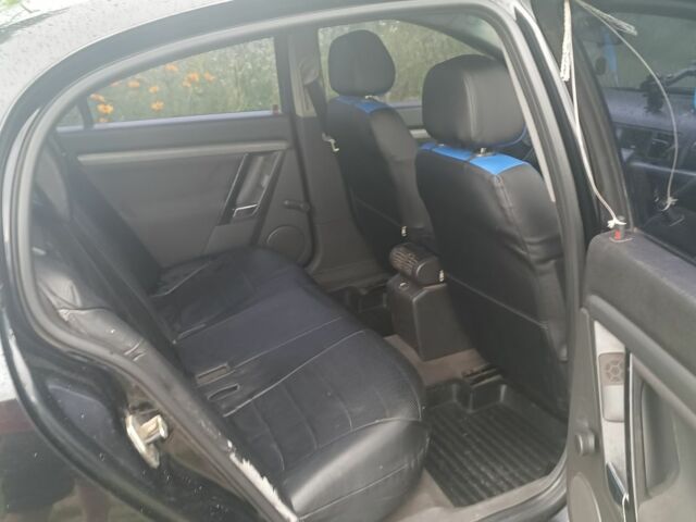 Черный Опель Вектра, объемом двигателя 2.2 л и пробегом 283 тыс. км за 3500 $, фото 1 на Automoto.ua