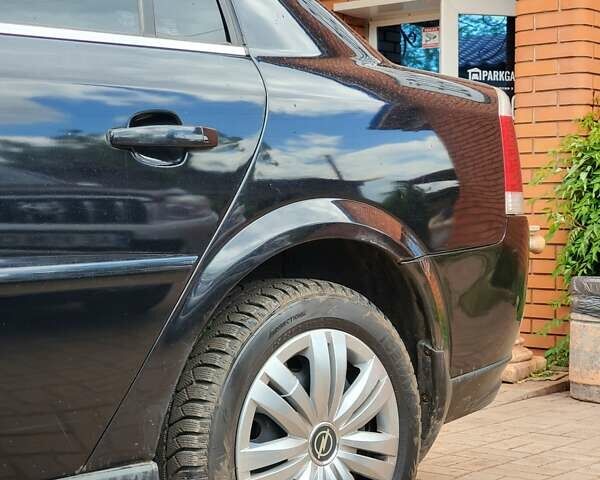 Черный Опель Вектра, объемом двигателя 2.2 л и пробегом 156 тыс. км за 4300 $, фото 4 на Automoto.ua