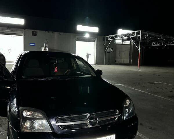 Черный Опель Вектра, объемом двигателя 2.2 л и пробегом 385 тыс. км за 3600 $, фото 1 на Automoto.ua