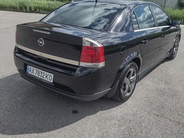 Черный Опель Вектра, объемом двигателя 2.2 л и пробегом 235 тыс. км за 4900 $, фото 6 на Automoto.ua