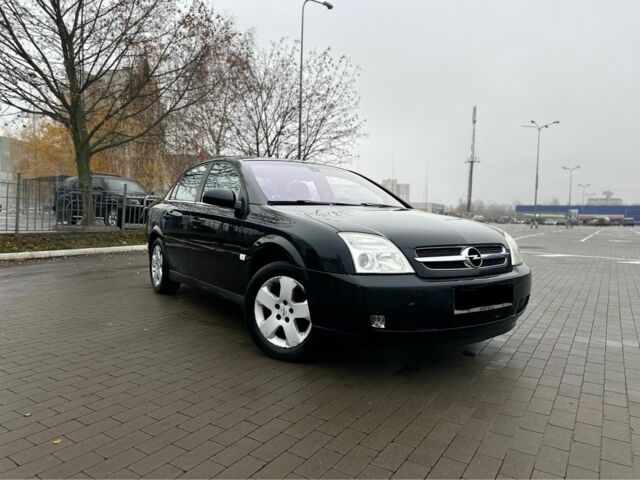 Черный Опель Вектра, объемом двигателя 2.2 л и пробегом 238 тыс. км за 3999 $, фото 4 на Automoto.ua