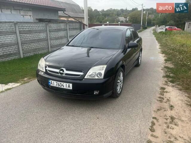 Черный Опель Вектра, объемом двигателя 3.18 л и пробегом 237 тыс. км за 6000 $, фото 1 на Automoto.ua