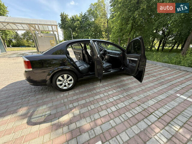 Черный Опель Вектра, объемом двигателя 2.2 л и пробегом 295 тыс. км за 5100 $, фото 62 на Automoto.ua