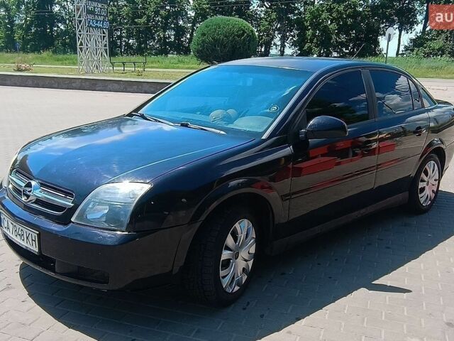 Черный Опель Вектра, объемом двигателя 2.2 л и пробегом 300 тыс. км за 3200 $, фото 1 на Automoto.ua