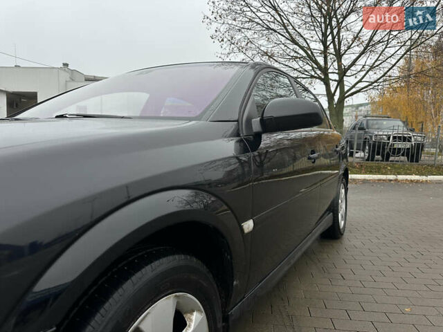 Черный Опель Вектра, объемом двигателя 2.2 л и пробегом 238 тыс. км за 3899 $, фото 3 на Automoto.ua