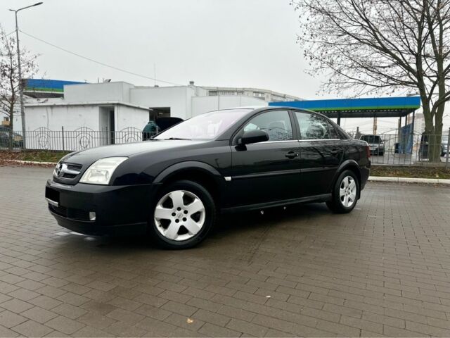 Черный Опель Вектра, объемом двигателя 2.2 л и пробегом 238 тыс. км за 3999 $, фото 1 на Automoto.ua