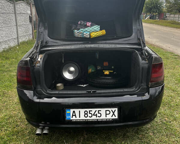 Черный Опель Вектра, объемом двигателя 2.2 л и пробегом 260 тыс. км за 5800 $, фото 2 на Automoto.ua
