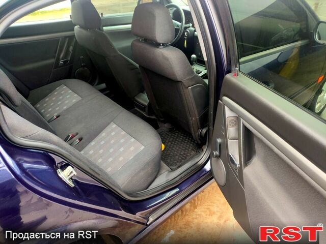 Черный Опель Вектра, объемом двигателя 2.2 л и пробегом 300 тыс. км за 4000 $, фото 10 на Automoto.ua