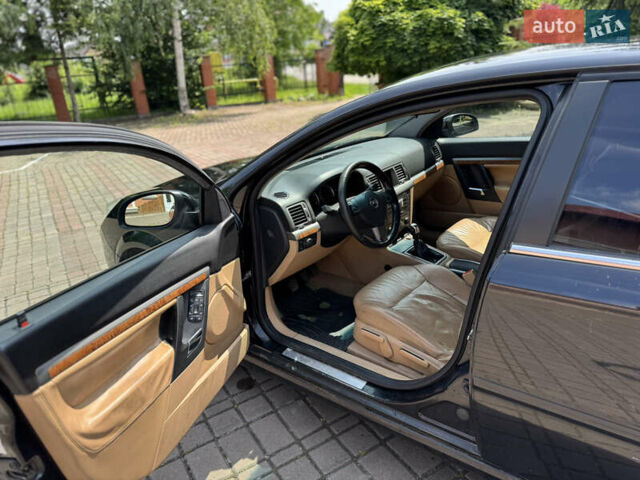Черный Опель Вектра, объемом двигателя 2.2 л и пробегом 222 тыс. км за 3000 $, фото 7 на Automoto.ua