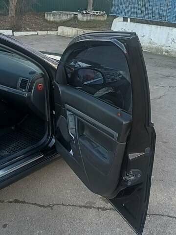 Черный Опель Вектра, объемом двигателя 2.2 л и пробегом 263 тыс. км за 5500 $, фото 11 на Automoto.ua