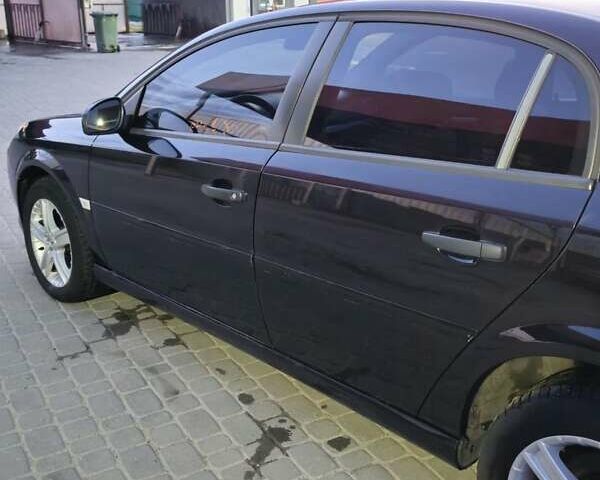 Черный Опель Вектра, объемом двигателя 2.2 л и пробегом 202 тыс. км за 6100 $, фото 4 на Automoto.ua