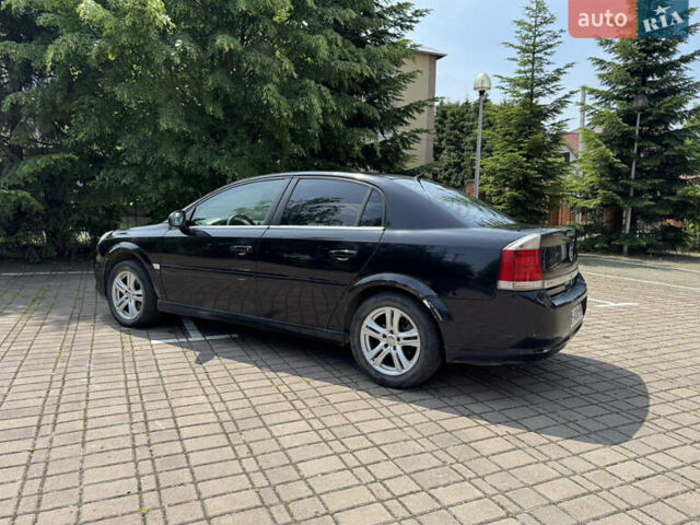 Черный Опель Вектра, объемом двигателя 2.2 л и пробегом 222 тыс. км за 3000 $, фото 6 на Automoto.ua