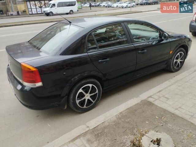 Черный Опель Вектра, объемом двигателя 2.2 л и пробегом 225 тыс. км за 4800 $, фото 5 на Automoto.ua
