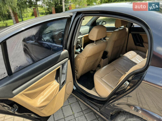 Черный Опель Вектра, объемом двигателя 2.2 л и пробегом 222 тыс. км за 3000 $, фото 11 на Automoto.ua