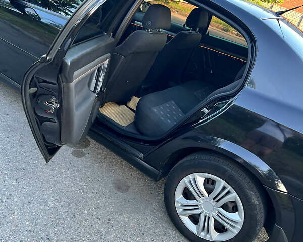 Черный Опель Вектра, объемом двигателя 1.9 л и пробегом 220 тыс. км за 5100 $, фото 7 на Automoto.ua